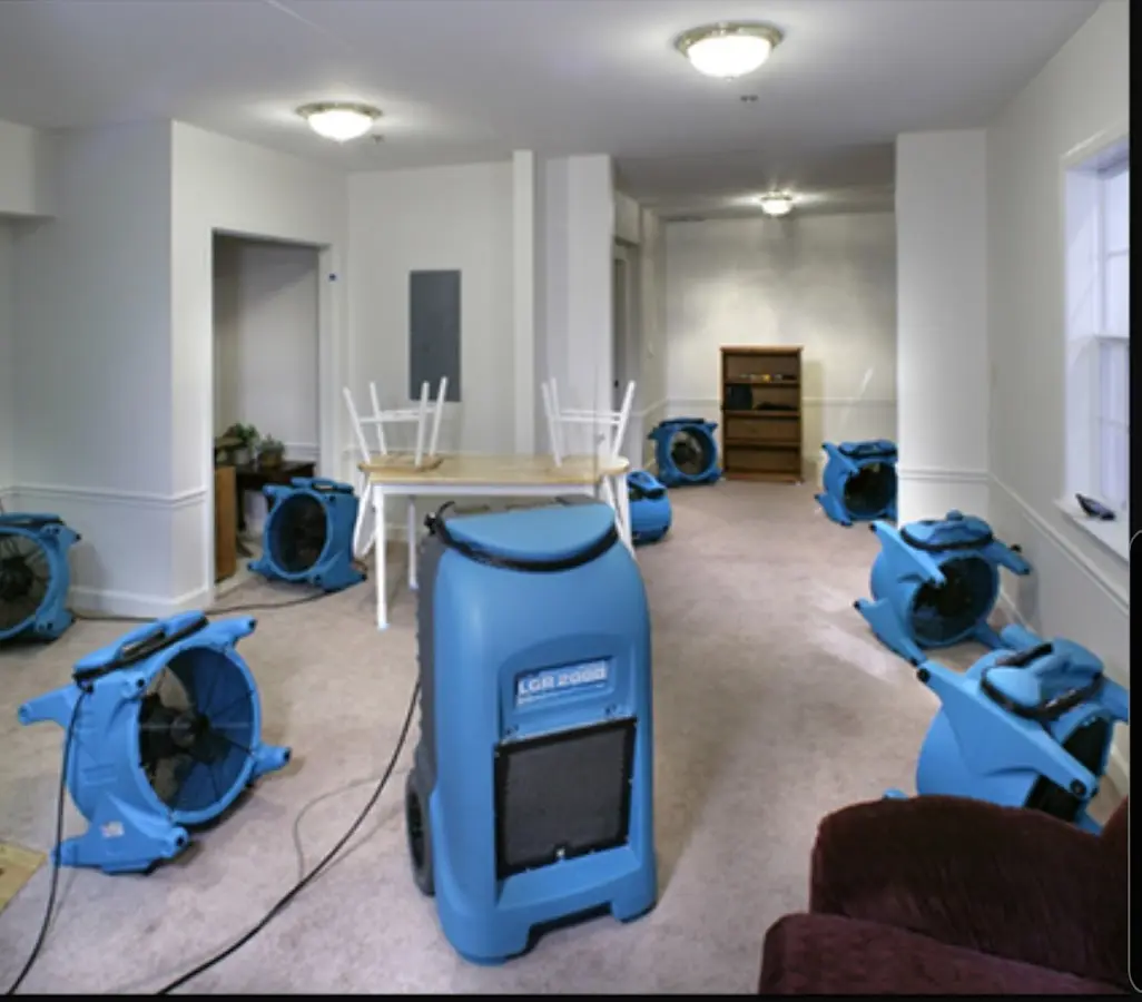 Air movers and dehumidifier setup for Water Damage Restoration in Clyde